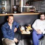 Alexey with a friend in a coffee shop