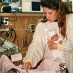 Newborn Ashley Benson with her mother